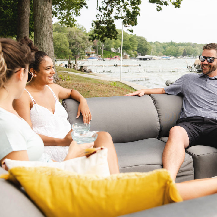 6pc weatherproof outdoor furniture friends relaxing outdoors #color_granite-bask