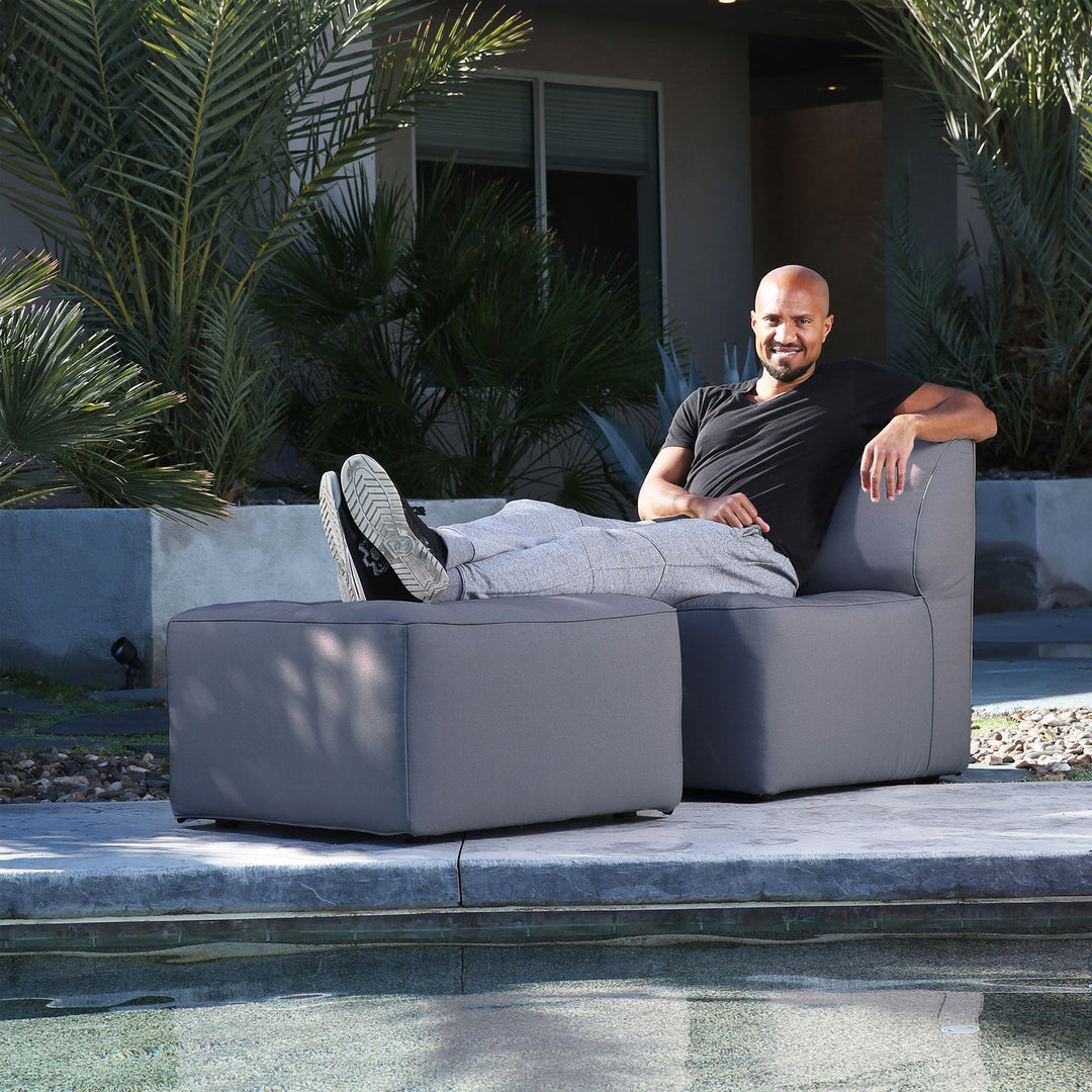 2 Piece Chaise Sectional Outdoor Patio Furniture with man relaxing #color_smoke-gray