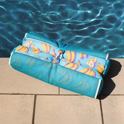 Banana Print Pool Hammock Float on a poolside 