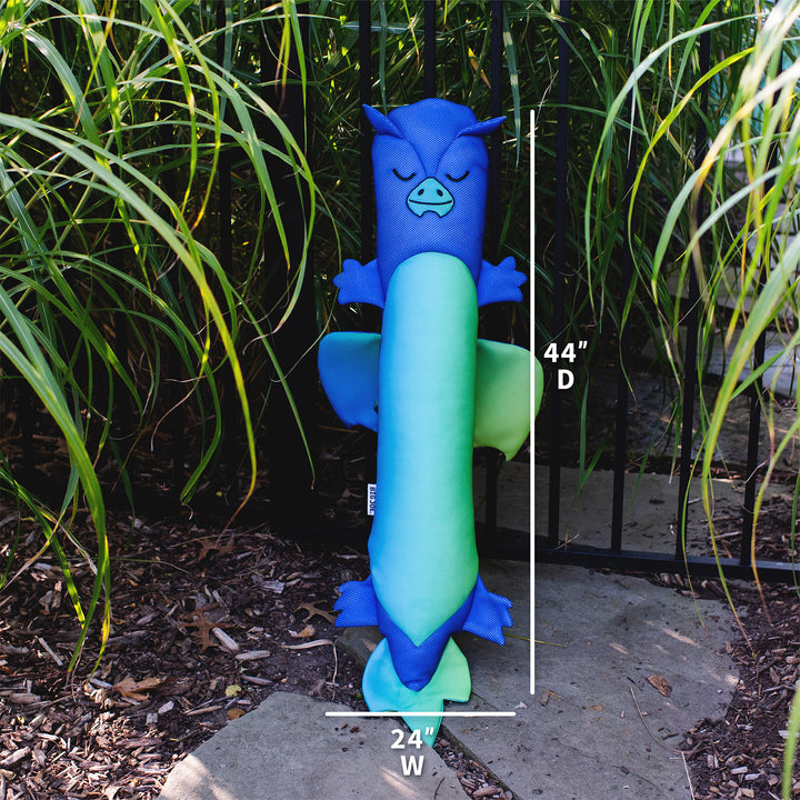 Blue and green dragon-shaped pool toy with dimensions against a natural background #style_dragon
