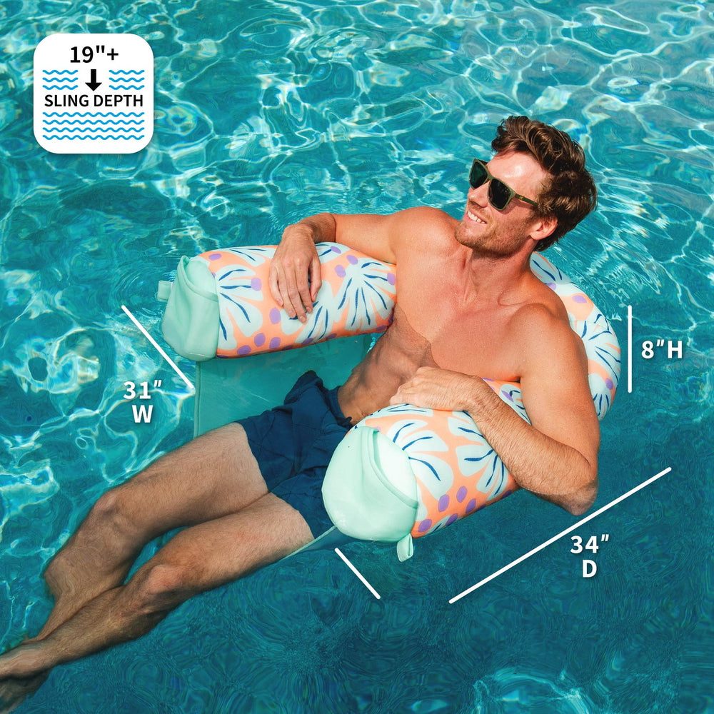 Man lounging on a colorful pool float with measurements displayed. #color_sweet-shells-peach