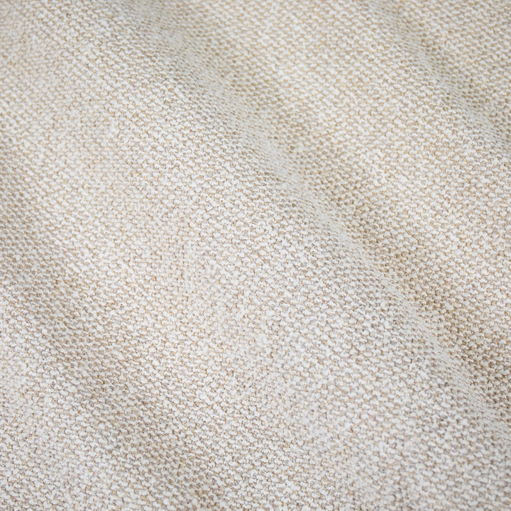 Close-up of beige fabric texture #color_sandstone-textured-boucle