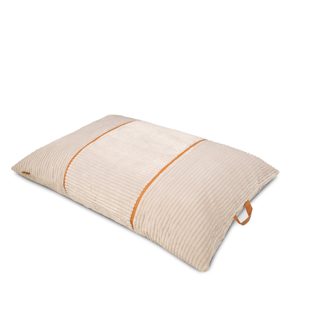 A rectangular beige corduroy pillow with two contrasting orange-brown stitched lines running vertically, shown on a plain white background. 