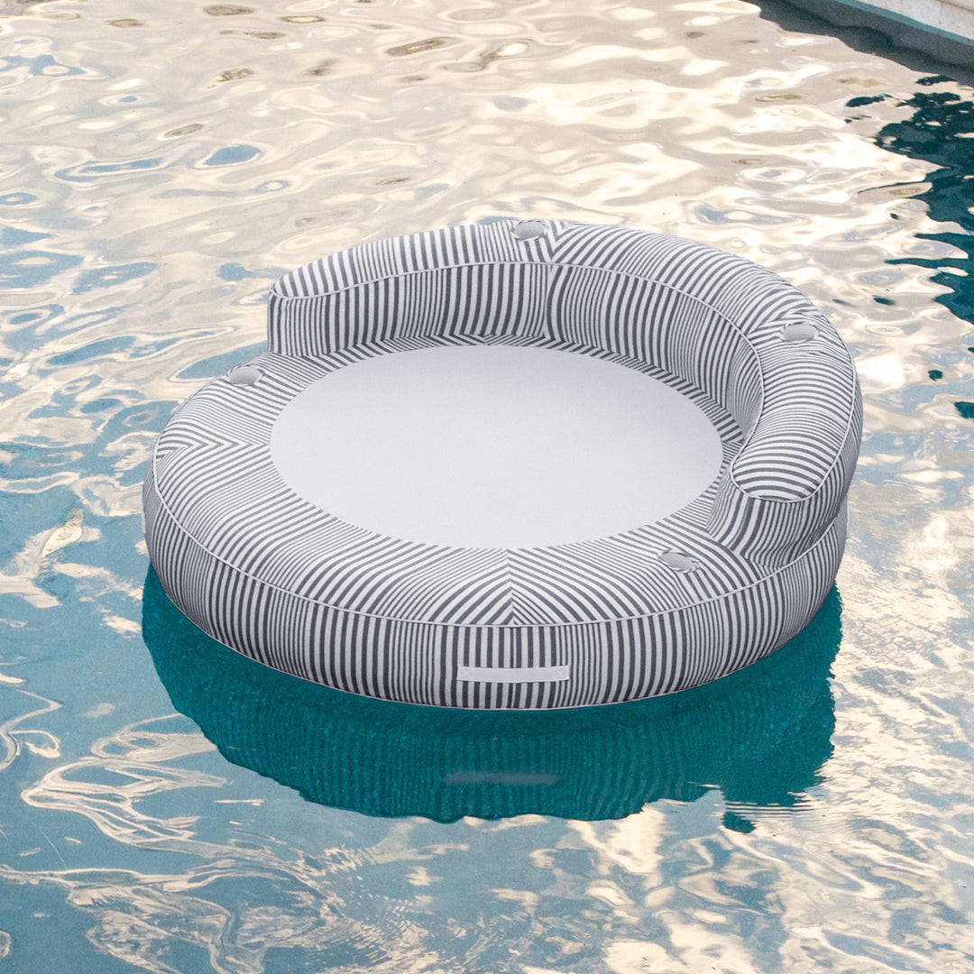 Inflatable pool float with geometric pattern floating on water #color_shoreline-gray-stripe-olefin