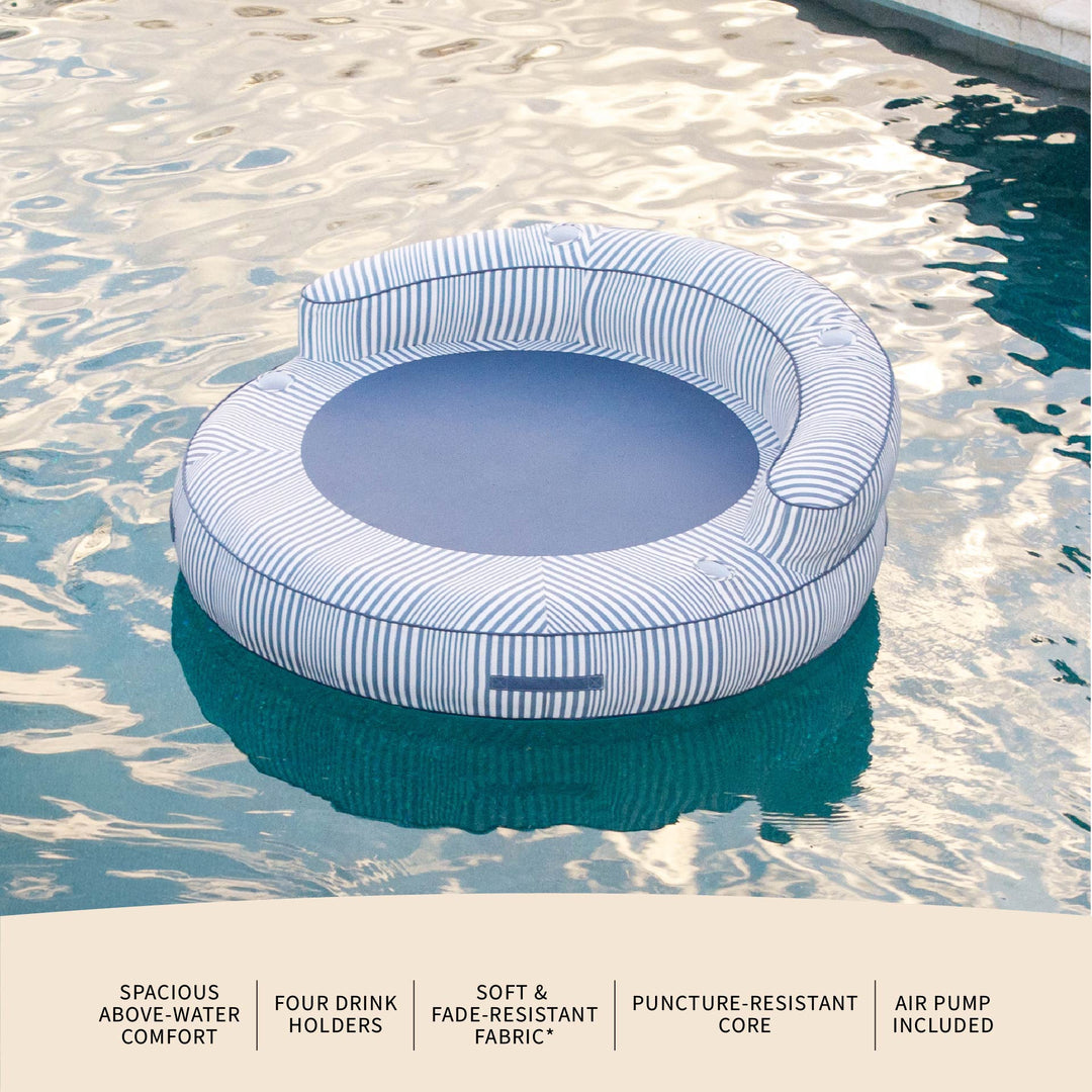 Inflatable pool float with drink holders floating in a pool #color_weekend-navy-stripe-olefin