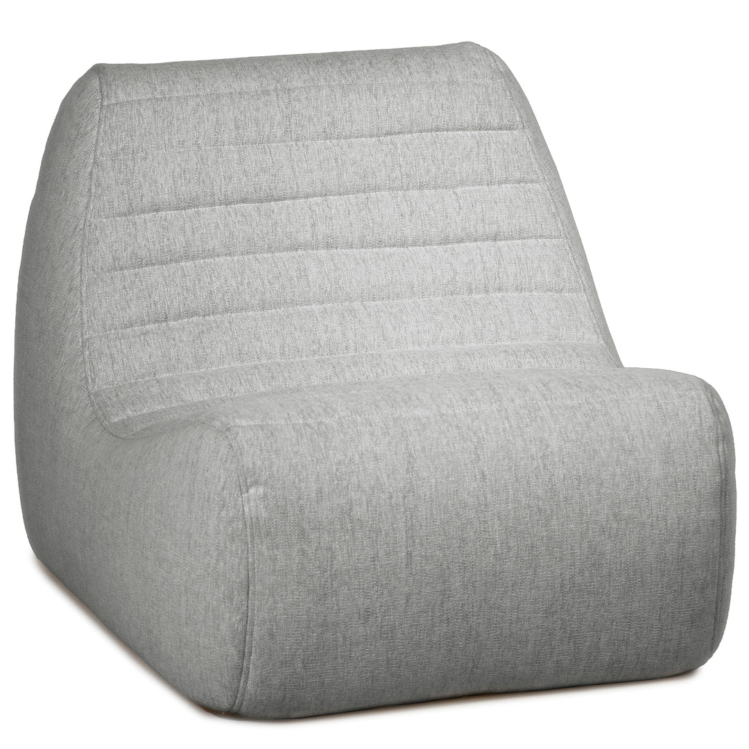 Gray wedge-shaped seat cushion on a white background #color_port-gray-outdoor-performance-linen