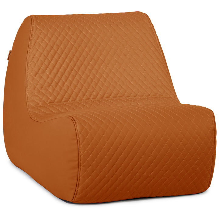 Orange quilted chair on a white background #color_honey-sand-outdoor-vegan-leather