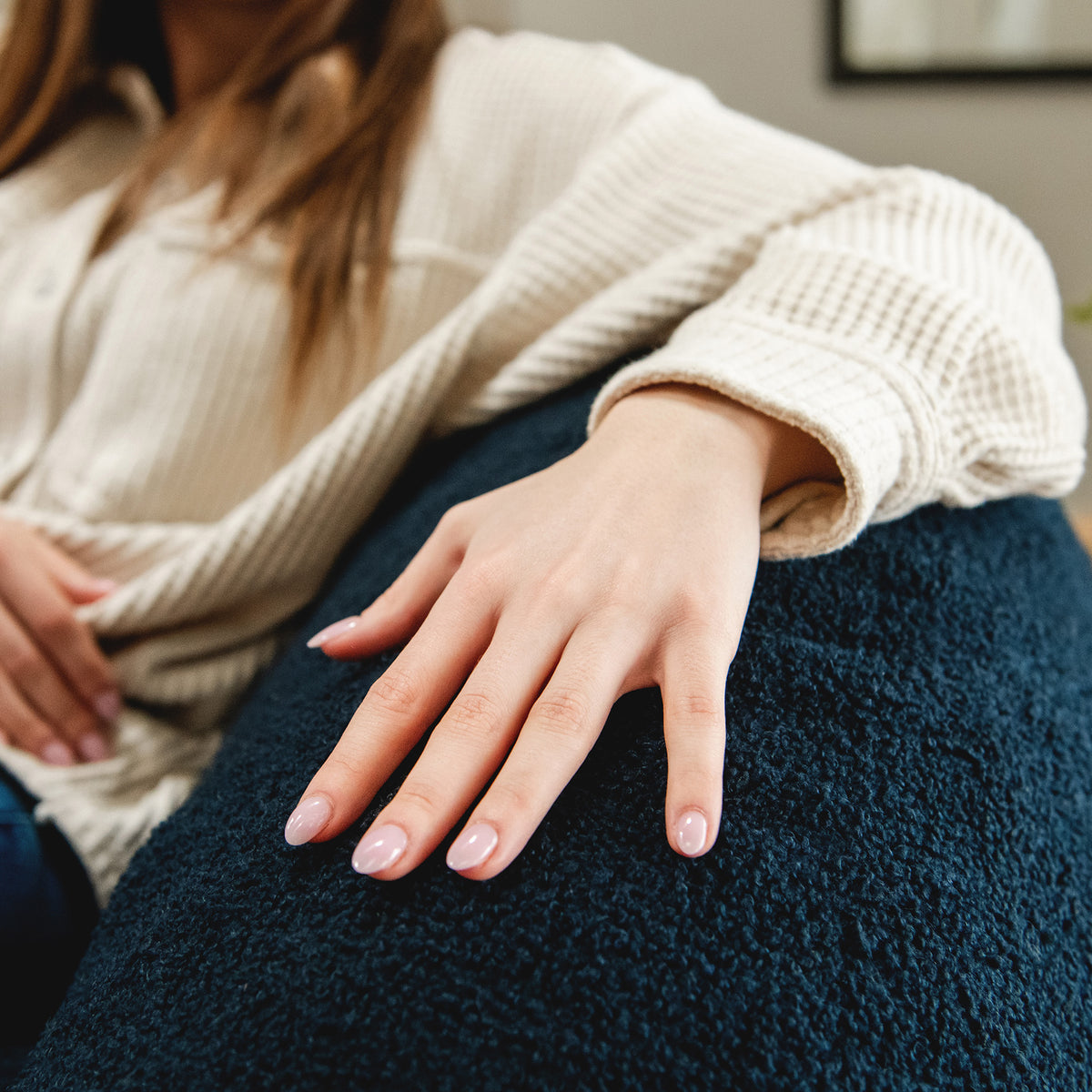 Woman touching the boucle fabric l