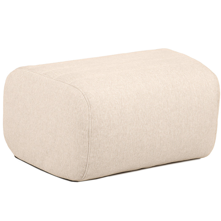Beige ottoman on a white background #color_sunlit-cream-outdoor-performance-linen