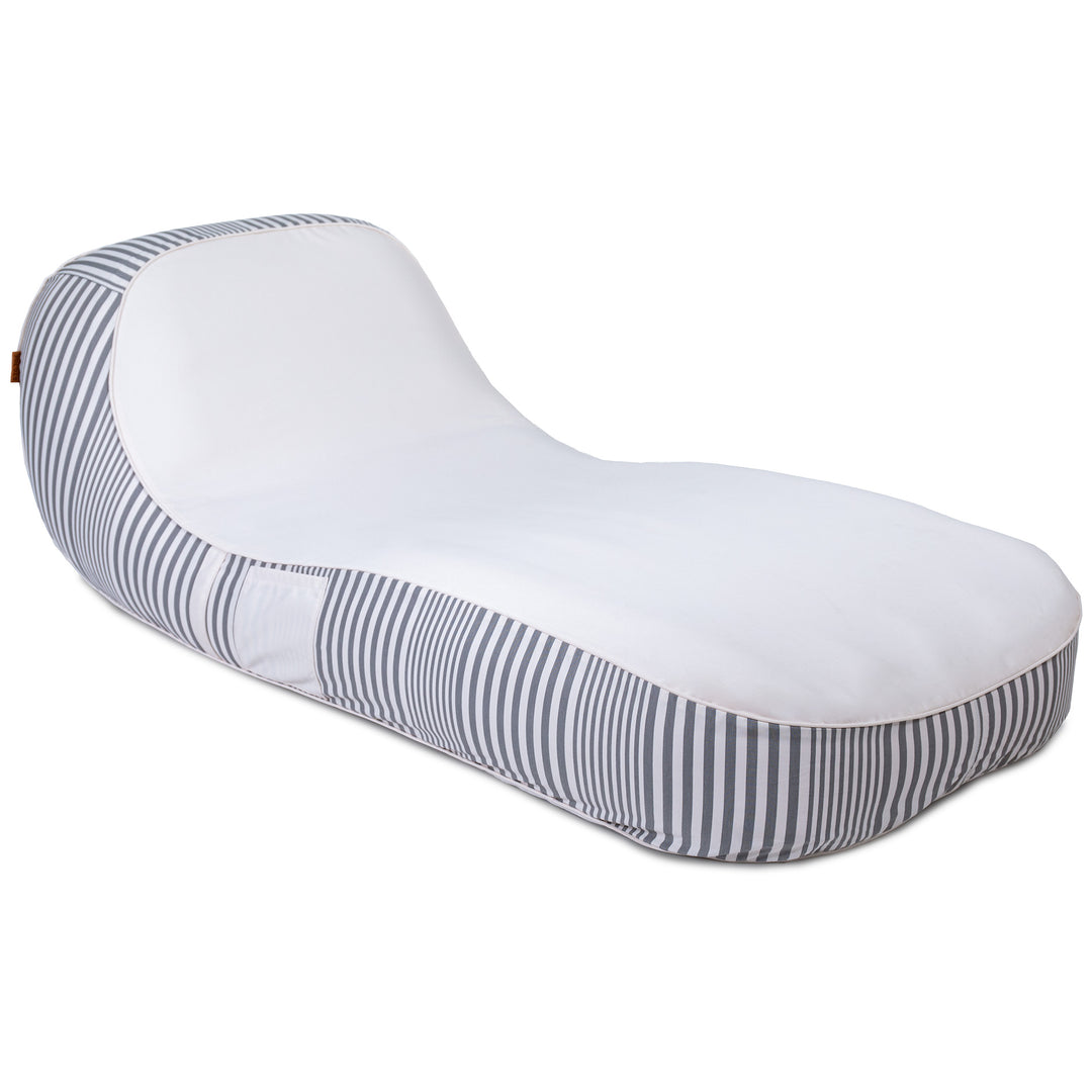 White and gray striped crescent-shaped pillow on a white background #color_shoreline-gray-stripe-olefin