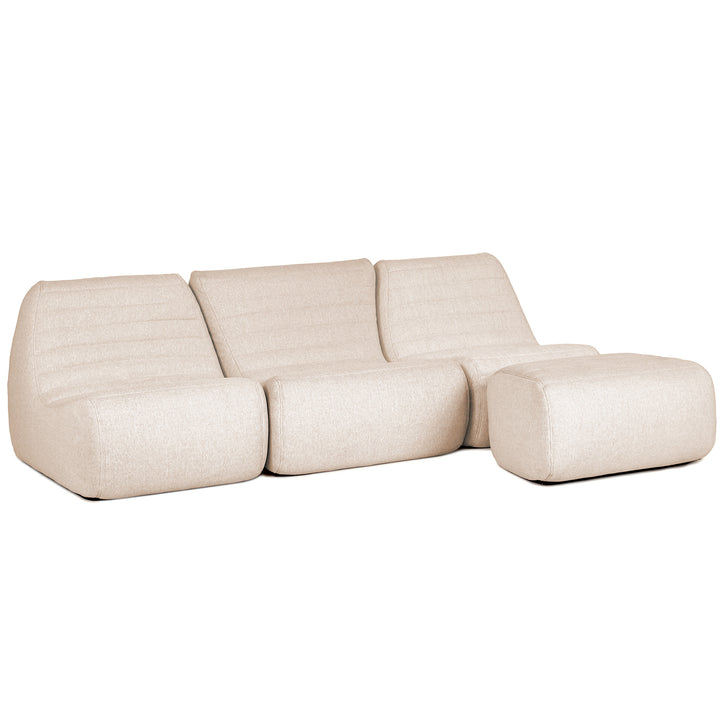 Beige sectional sofa on a white background #color_sunlit-cream-outdoor-performance-linen