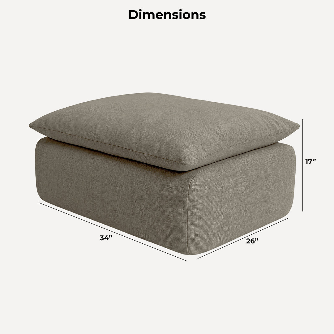 A gray upholstered ottoman or floor cushion with a matching top cushion, shown with dimension labels and lines indicating 34 by 26 by 17 inches on a light gray background. 