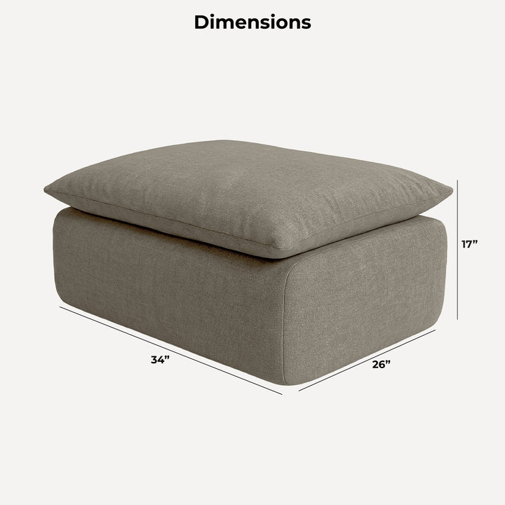 A gray upholstered ottoman or floor cushion with a matching top cushion, shown with dimension labels and lines indicating 34 by 26 by 17 inches on a light gray background. 