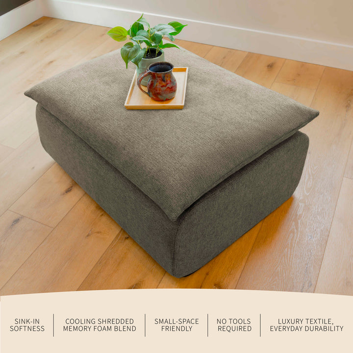 Gray ottoman on a wooden floor with a plant and tray on top, featuring text about product features. 