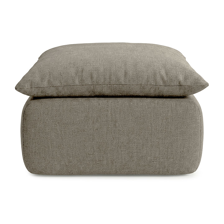 Gray fabric ottoman with cushion on a white background 