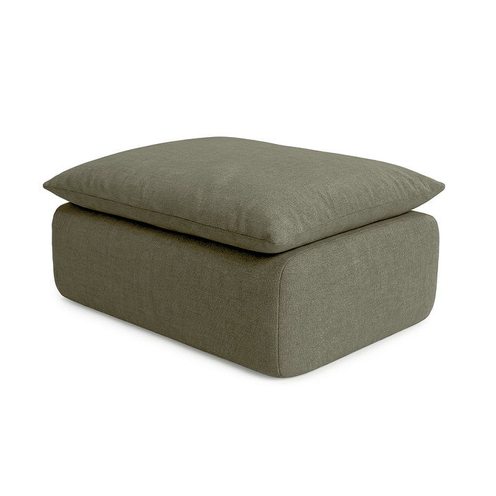 Green upholstered ottoman on a white background 