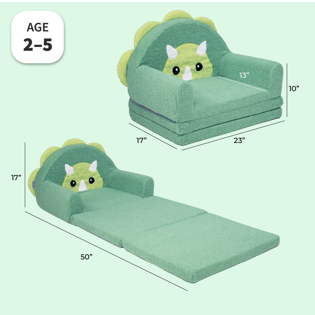 Green dinosaur-themed floor sofa shown in two configurations: as a small armchair and as a floor cushion. The sofa features a plush green body, a dinosaur face on the headrest, and dimension lines indicating measurements of 17x23 inches for the chair and 17x50 inches for the folded floor cushion, on a pale mint green background. 