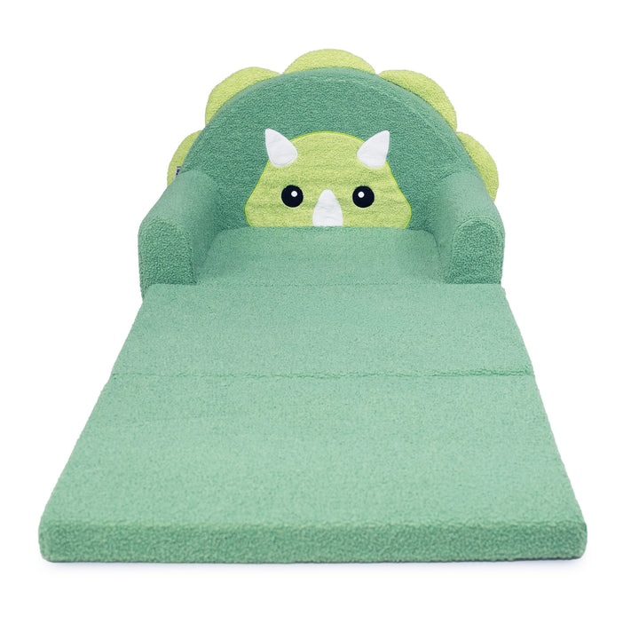 A green dinosaur-themed floor cushion or play mat with a plush headrest shaped like a cute cartoon Triceratops, shown on a plain white background. 
