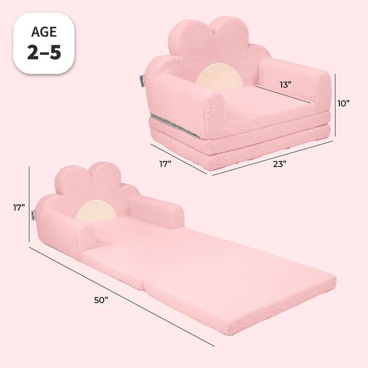 Pink cloud-shaped toddler floor sofa with a built-in headrest and armrests, shown in two views with dimensions: one as a small seat cushion and one as a floor bed. Includes an &