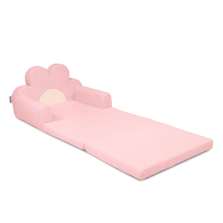 A pink convertible toddler play couch that transforms into a flat mattress, featuring a cloud-shaped headrest with a built-in crescent moon accent and armrests, shown on a solid white background. 