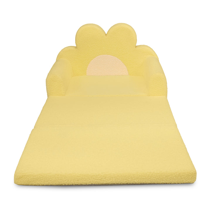 A yellow plush foam play mat with a cloud-shaped backrest and a small sun motif, shown on a plain white background. 