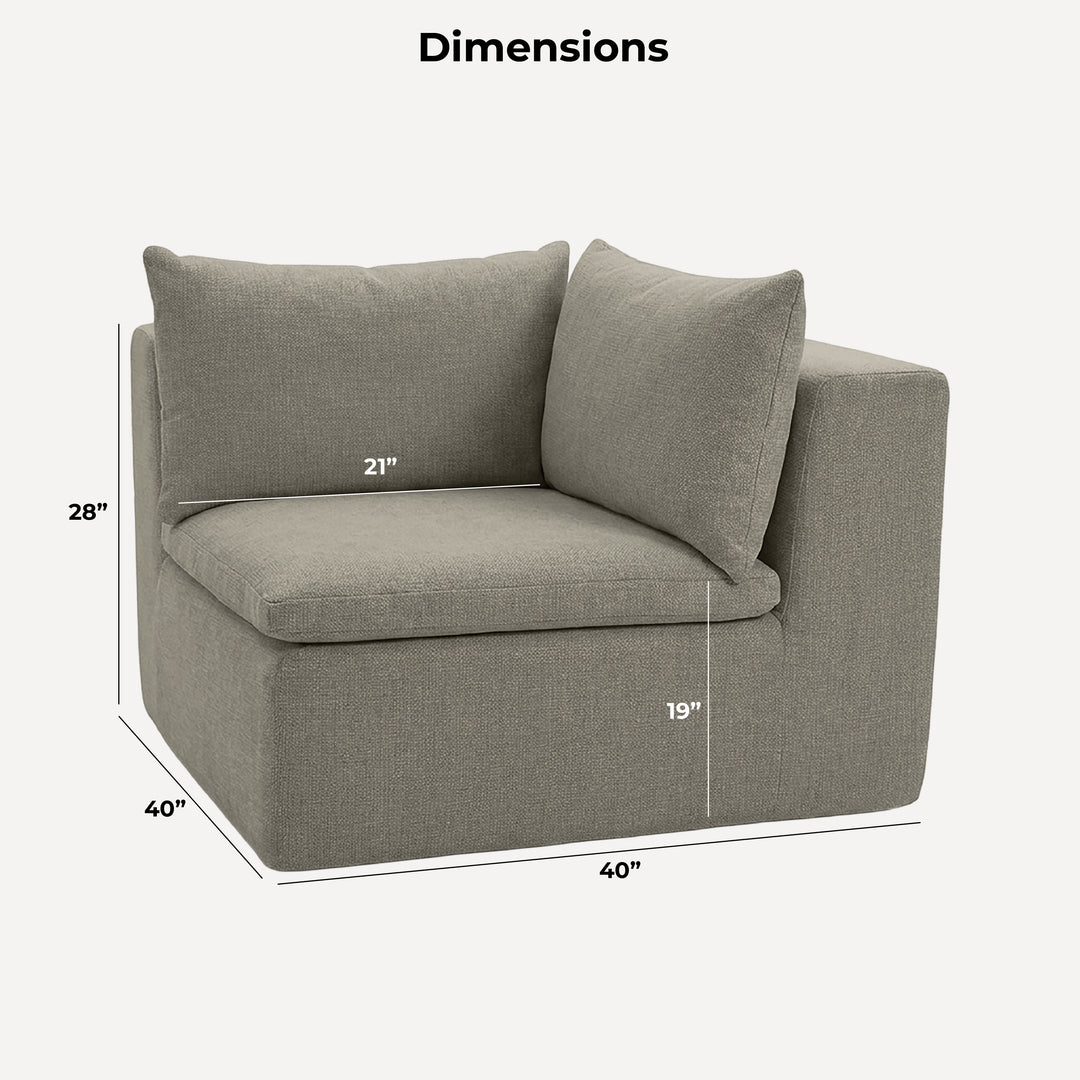 Gray corner sofa with dimensions marked on a wooden floor. 