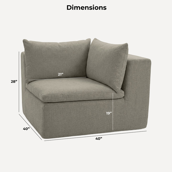 Gray corner sofa with dimensions marked on a wooden floor. 