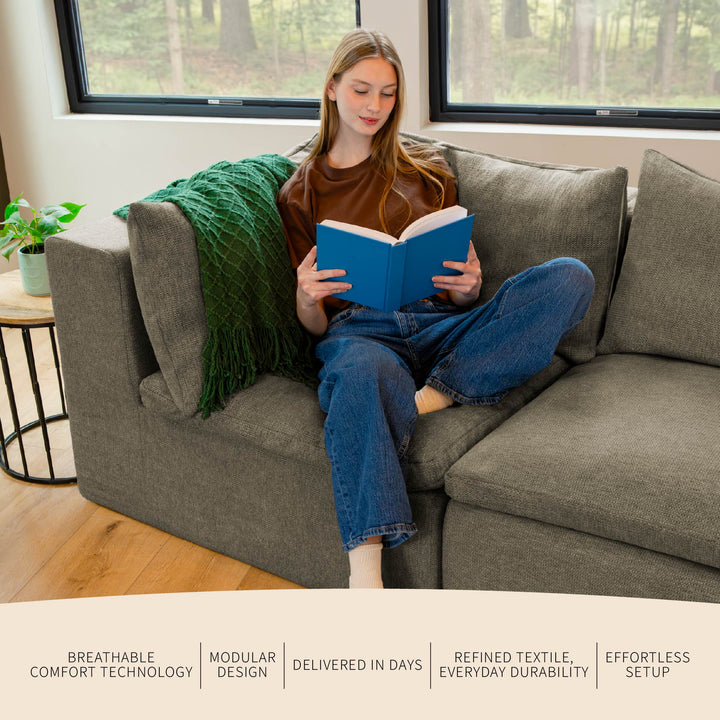 Woman reading a book on a corner chair of the sofa, with features and benefits listed. 