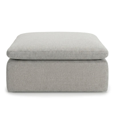 Gray upholstered ottoman on a white background #color_cottage-gray-terra-knit