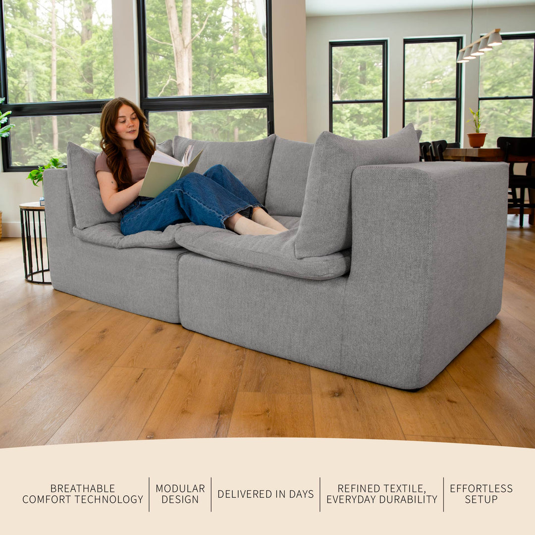 Woman relaxing on a loveseat reading a book with features and benefits listed 