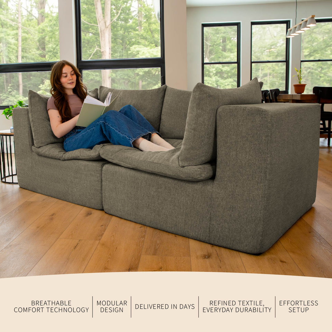 Features and benefits for the Averra Love seat with woman reading on the couch 