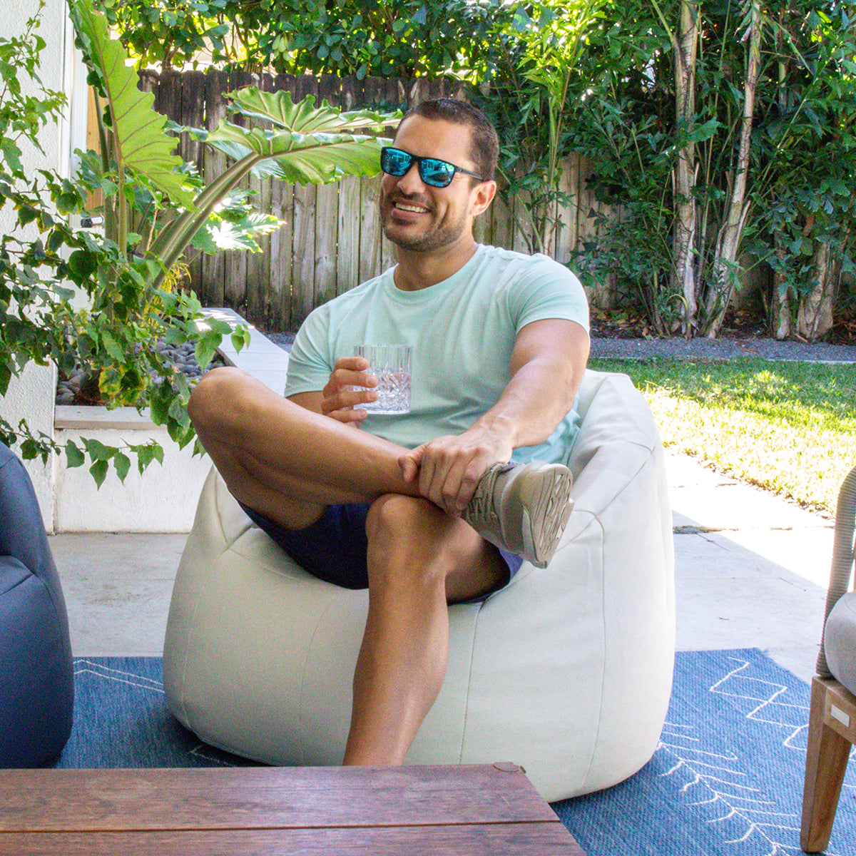 Relaxing outdoors in a bean bag chair 
