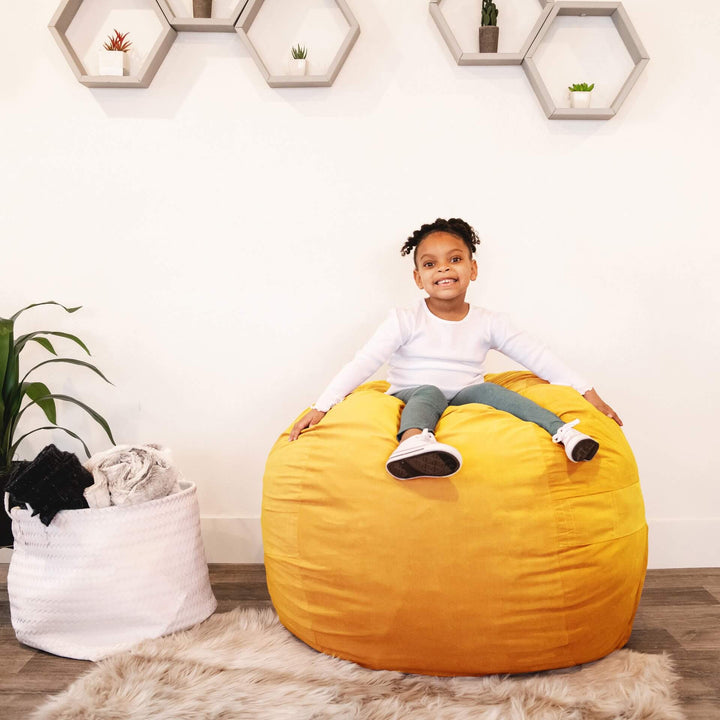 fuf medium foam beanbag with young girl sitting #color_mustard-plush