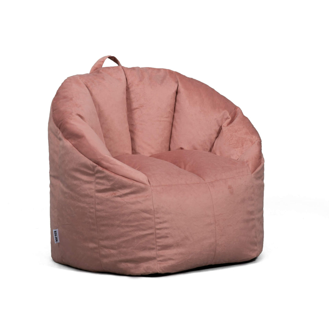 Milano Adult Beanbag Chair woman relaxing in living room side #color_desert-rose-plush