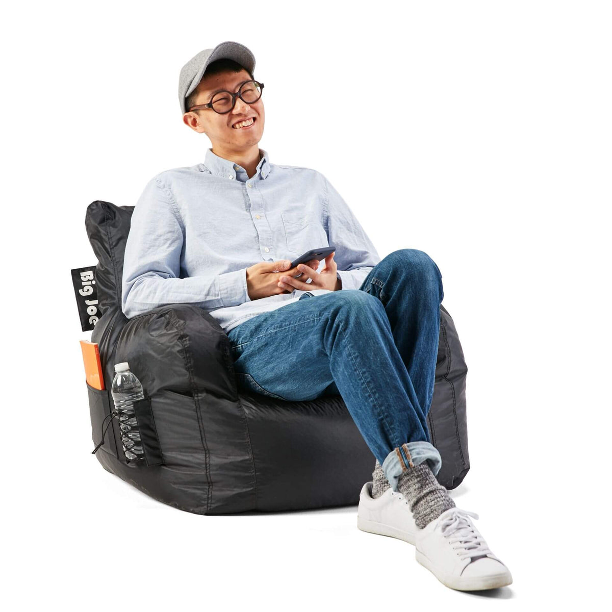 College student on dorm bean bag chair 