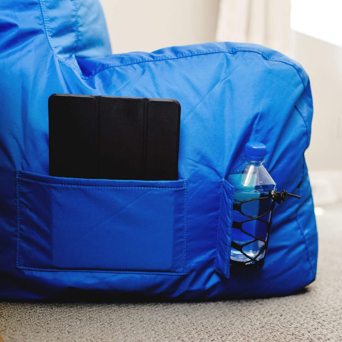 Dorm beanbag chair with pockets and cup holder 