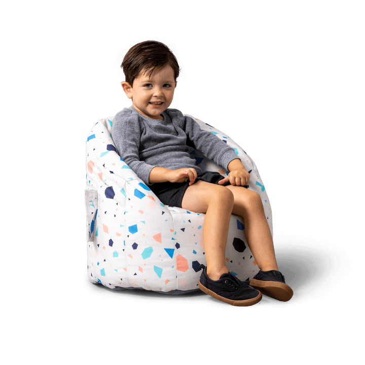 Milano Kids Beanbag Chair with Backrest boy relaxing #color_dolce-terrazzo-lenox