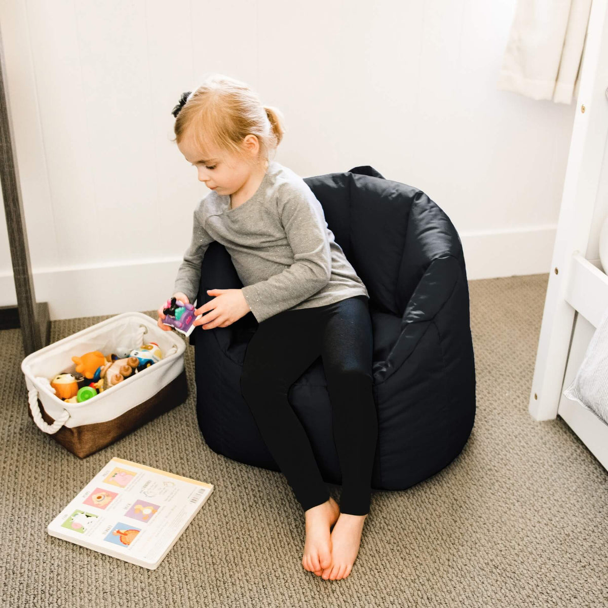 Milano Kids Beanbag Chair Kid playing with toys 