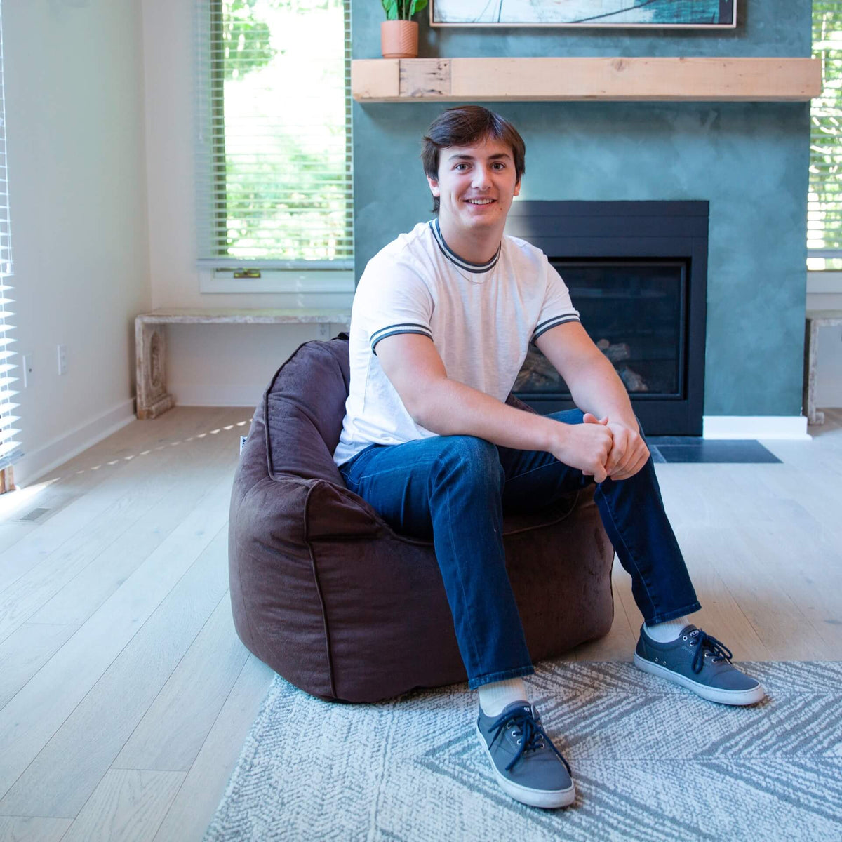 Man on adult beanbag chair 