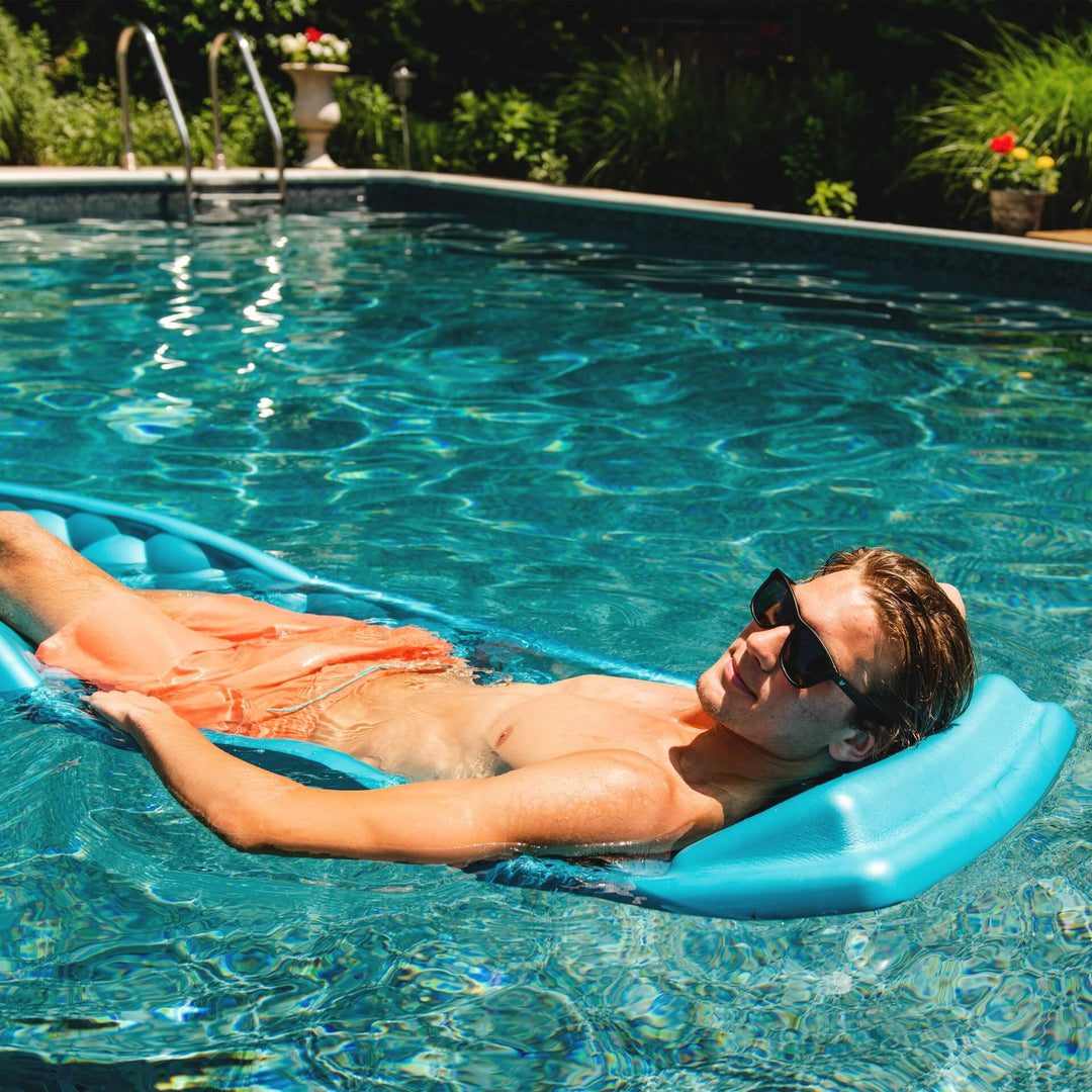 Aquaria Solana Lounge Float man relaxing in pool #color_aquaria-aqua