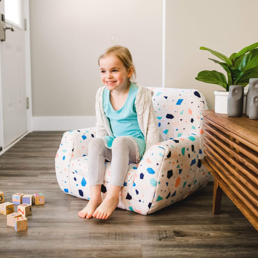Kids chair Mid-Mod little girl relaxing #color_dolce-terrazzo-lenox
