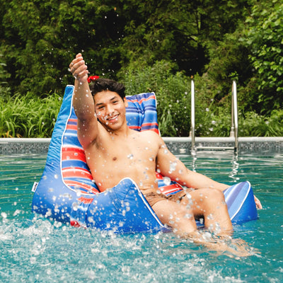 Big Joe Captains Float Blurred Americana teen floating in pool 