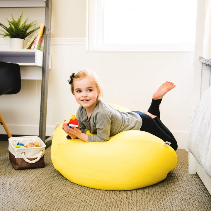Yellow beanbag chair with girl #color_buttercup-gabardine